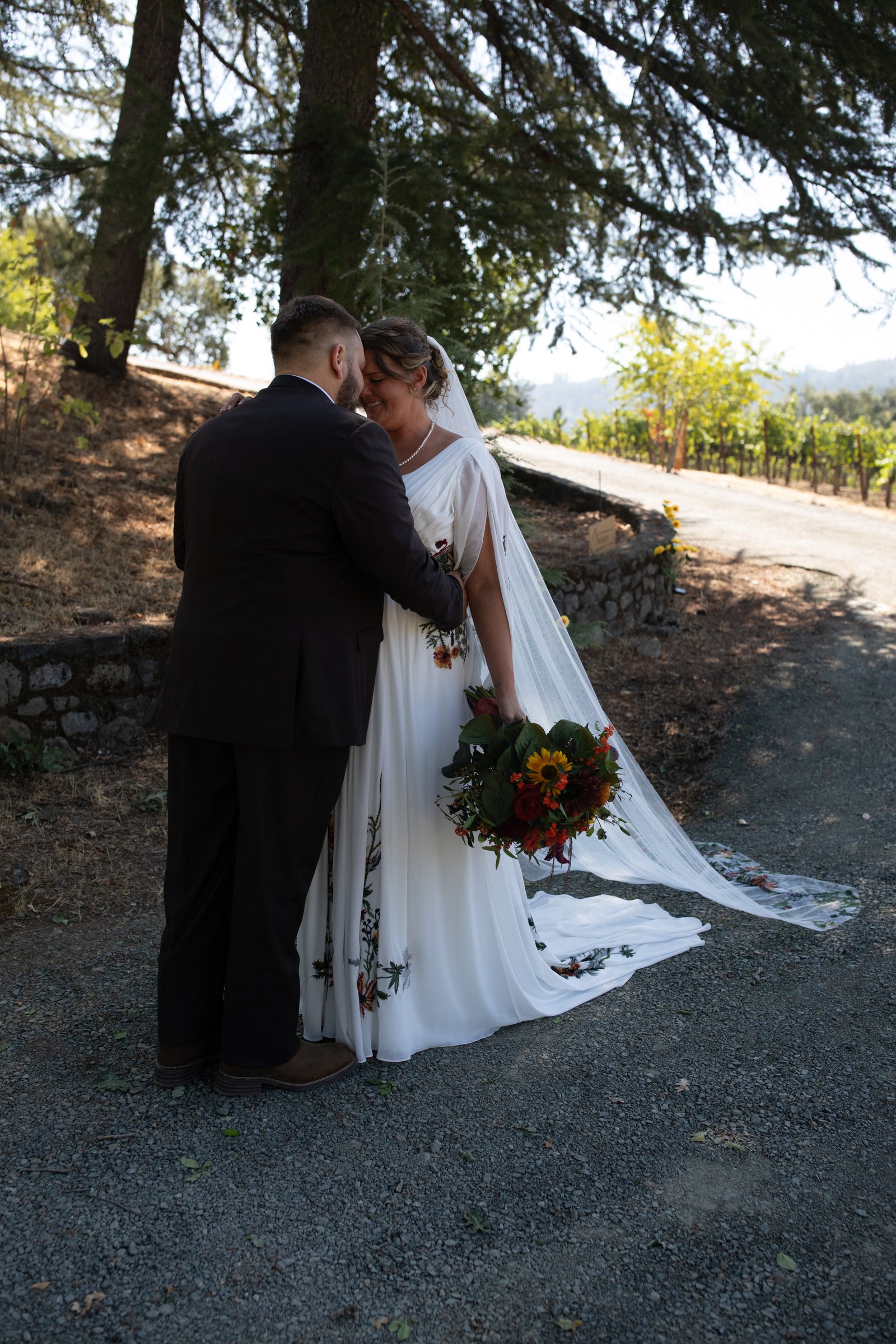 Romantic wedding couple in vineyard